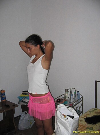 Here's a lim'd word description of that bitch in her skimpy ass skirt, flauntin' her fucking flabby fat ass for the fucking paparazzi to fucking take pics and post on the fucking internet. Shit.