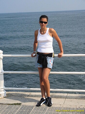 "F*ckin' b*tch in a f*ckin' denim skort and white tee, chillin' by the goddamn sea with her fat ass against that sh*tty metal rail. Don't even get me started on that slutty ponytail."