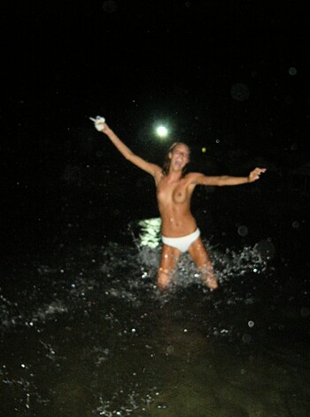 A bare-titted bitch splashing around in the water like a fucking moron at fucking midnight, you goddamn pervert.