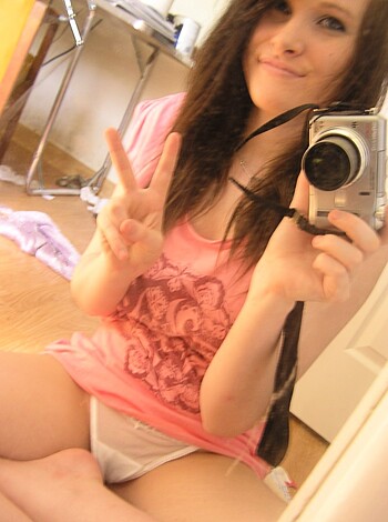 "Bare pussy and ass on full display as panties are around the ankles."
