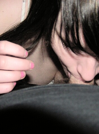 Vulgar Description:
Here's a shot of some slutty bitch deep-throating some lucky fella's dick like the whore she is, with her tongue all the way up his shaft and her lips wrapped tight around his balls. Goddamn!
