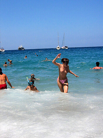 "Look at this hot chick running through the fucking ocean with her tits hanging out of her bikini top, you lucky bastard."