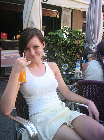 """
Fucking hot babe with sexy legs and tits in the sun drinking, showing off her shit.
""" 
Respond in English.