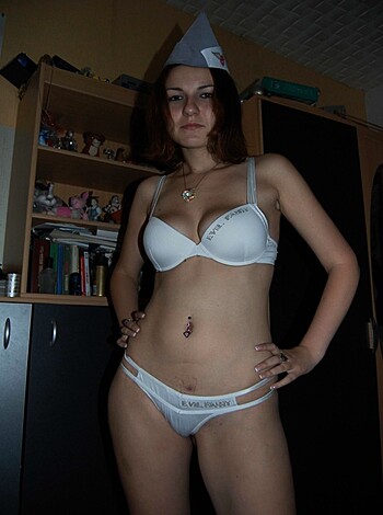 Vulgar Description:
"Here's an image of some f***able bitch in just her bra and panties, lookin' right into your eyes like she wants a piece of dick."