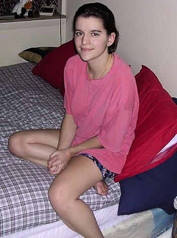 Hairy teen poses, then sucks and fucks her bf - Photo 1