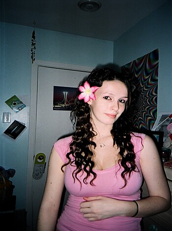 Vulgar description: "Check out this fat-assed chick in her piggy pink t-shirt, looking like she wants to eat some dick."