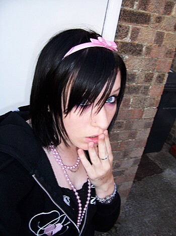 "Take a fucking gander at this goddamn image of some hot-ass bitch with her sexy little mouth wateringly tugging on that fucking pink fucking ribbon, you perverts."