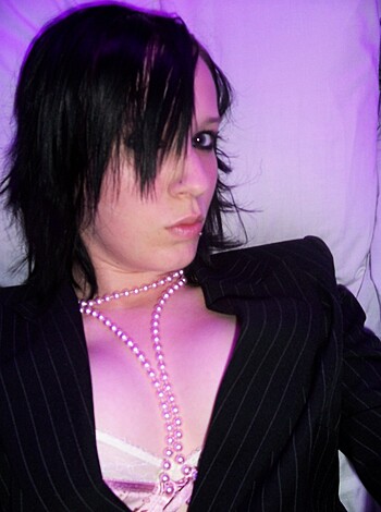 "Groovy fucking shot of some hot chick lying on her back with her tits out, showing off her toned stomach."