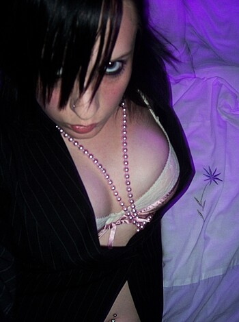 "Check out this f*cking hot babe in her friggin' sexy lingerie with those pearly white tits a'flappin' around like a pair of squeezed watermelons as she slides them damn legs open, sittin' on that goddamn bed like the f*cking queen she is."