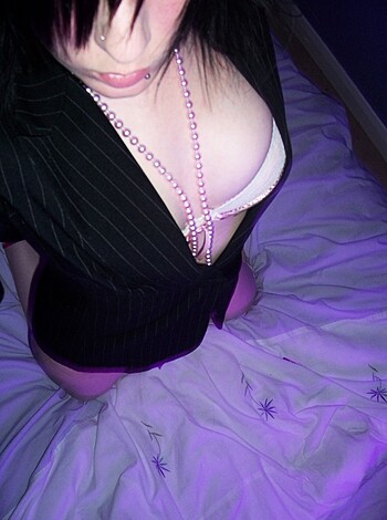 Here's a pic of some chick in her panties and some bling, bitch.