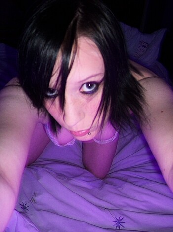 Vulgar description: Look at this bitch's tits. She's got no fucking shirt on, but her bra is tight as hell.