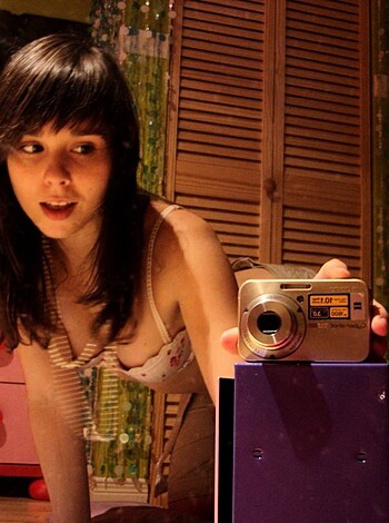 "Mirror selfie of tits and ass."