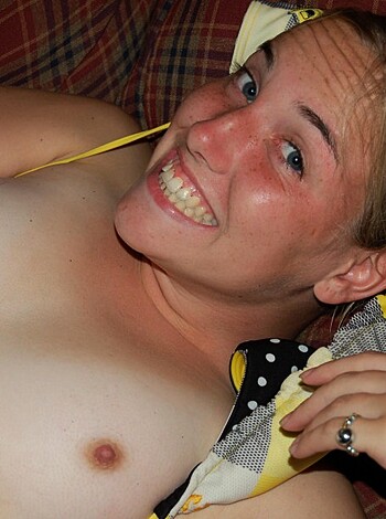 "Lady fucking on sofa w/o top, sucking dick."