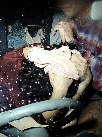 "Check out this fucking hot piece of ass bitch as she sits on some dudes lap, showing off her sexy bra and panties while riding dirty in his fucking car."