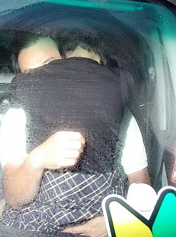 Here's the caption: "Look at this fucking image of some bitch with huge tits holding her baby in the backseat of her goddamn car."