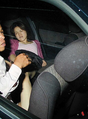 "Fuckin' night vision shot of some dude drivin' with his kid, both wearin' seat belts. No tits or ass in sight."