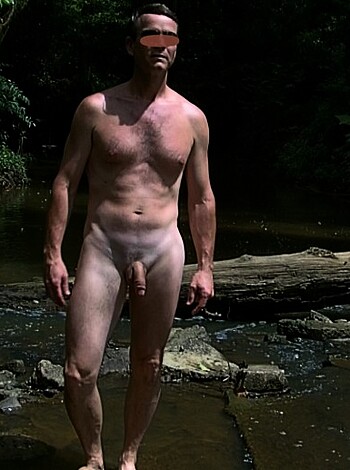Here's a fucking nude dickhead ass-out by the goddamn river, motherfucker!