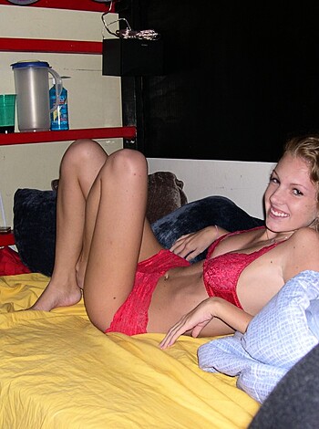 Hot teen shows on bed - Photo 1