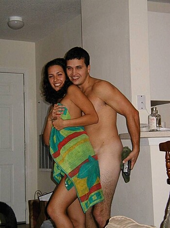 """
Fucking hot couple bangin’ in their crib; chick wrapped in towels, glowing with delight.
"""