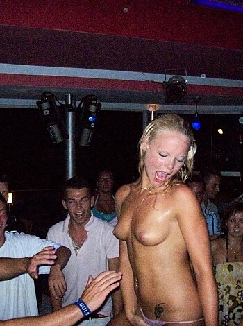 Fucking hot naked chick groovin' with a bunch of dudes in this pic.