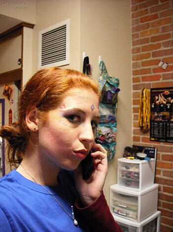 "Listen up bitch, lemme splain somethin to ya. You're a fucking moron if ya think we give a shit about your little story about some bullshit phone call with ya freakin' ear buds in. Fuck off and die."