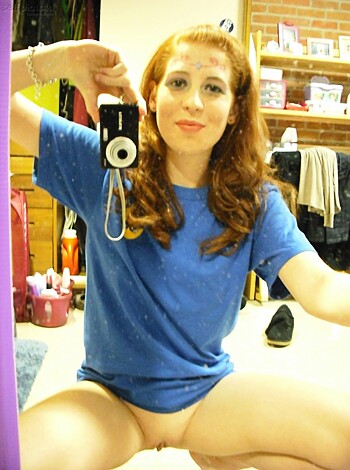 "This chick's takin' a fuckin' selfie while sittin' on some bedsheets with her blue t-shirt on and her hair all done up like a goddamn surfboard. What the hell, right?"