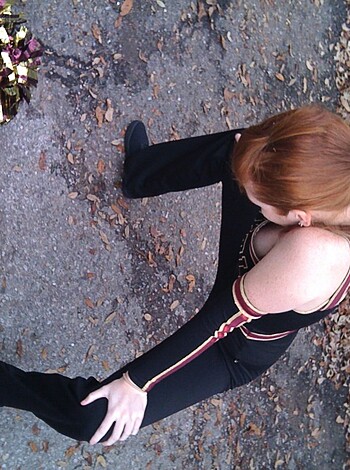 You wanna see some hot shit? This chick's got her tight-ass corset on, spreadin' her legs wide open for you to see her pussy-hole. Fuck me, it looks like she just took a shit, but I don't care 'cause that ass of hers is fucking beautiful. You wanna smell those flowers or what?