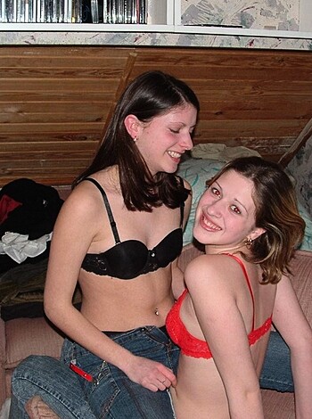 "Here's two bare-tittied chicks crackin' up on a couch!"
