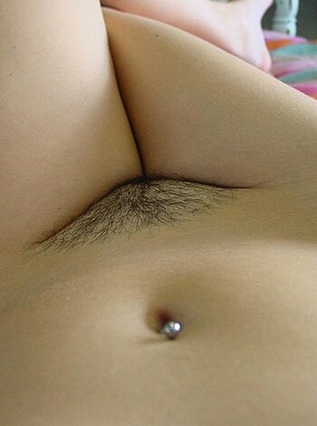 A fuzzy-assed kitten with its fur all over the place, get ready to stroke and scratch those itchy mounds of fluff.