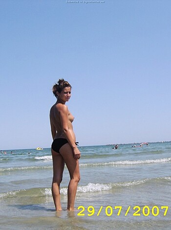 "Check out this chick sunbathing in her tight little bikini at the fuckin' beach, motherfucker!"