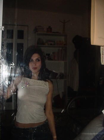 ```
Here's a fucking hot bitch taking a selfie with her shirtless titties and tight ass jeans hanging out. 
Address is unimportant, let me grab my camera. 
I mean, god damn this chick is fine as hell and her nails are on point too."