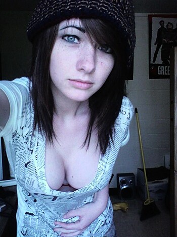 """
Look at this fucking picture of some chick with a dumb ass beanie and an untucked shirt, showing off her fat tummy. What the hell is that? 
""