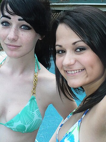 """
Two slender chicks snap pics in skimpy swimsuits by the pool, their titties flopping around and wet hair drippin'. 
 """