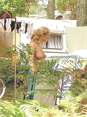Fucking bitch gets fucked by cocky dickwad while wandering through trees without clothes on.