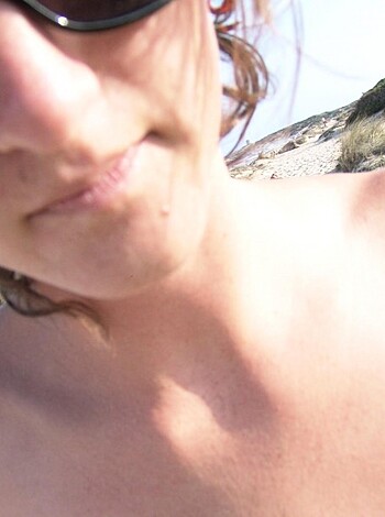 """
Big tits on the sand!
"""