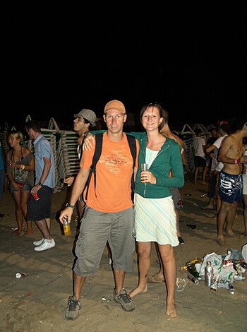 A couple getting frisky on the shore with their dicks out and pussies open for all to see while they masturbate each other.