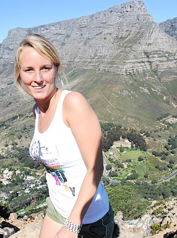 "Here's a photo of some fuckin hot bitch standin' on a motherfuckin' rocky ass hill with that Table Motherfuckin' Mountain in the back."