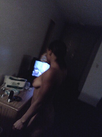 """
A fuckin' naked bitch posing in a goddamn room.
"""