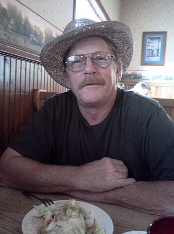 "This douche bag is sporting a dick hat with some chonies on his face."