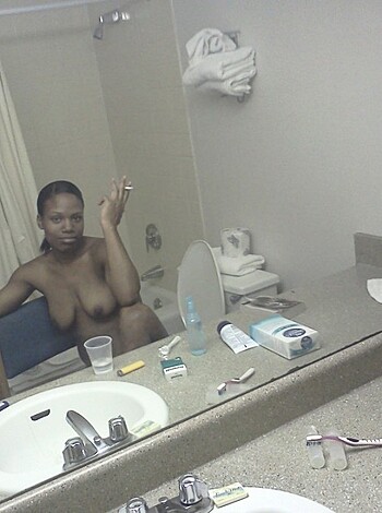 Here's a fucking picture of a hot naked chick, taking a shit with her tight little ass covered by some skimpy panties, and she doesn't even give a fuck about anyone who sees it. You better appreciate this shit before I send you to hell, motherfucker.