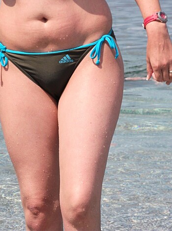 "God damn bitch is showing her ass off in this pic! Shes a fucking slut!"