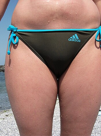 Vulgar description: "Bitch's fat ass thighs in black and blue thong panties."