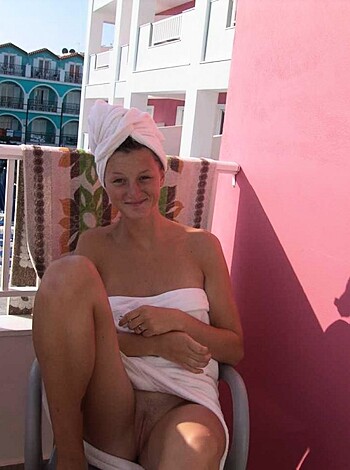 "Here's a fucking pic of some slutty bitch, who looks like she just got outta the shower or somethin', sittin' on a chair with no top on, wrapped up in towels, smile on her face, legs wide open. Yeah, that about sums it up."