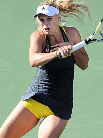 """
A chick with tits and ass is holding a fucking tennis racket, bro.
"""