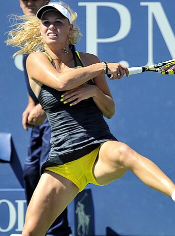 "Girl gets pounded on court by racket."