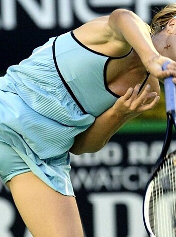 A fuckin' sexy babe with toned legs is giving it her all on the goddamn tennis court, slamming the shit outta that goddamn ball like a friggin' beast!