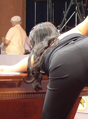 Fucking hot babe with a fat ass bent over the fucking pool table, while her fucking sexy legs are spread wide open.