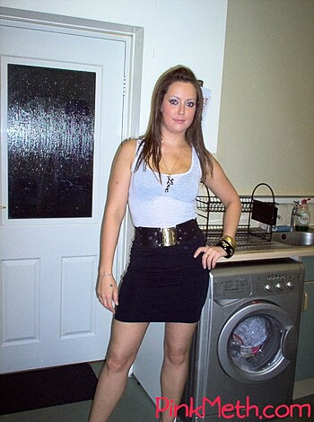 "F**k that sh*tty photo! It's some chick tryin' to look cool by posin' indoors with a short skirt on and a belt around her fucking waist, while there's goddamn appliances in the background. Who gives a flying f*ck?!"