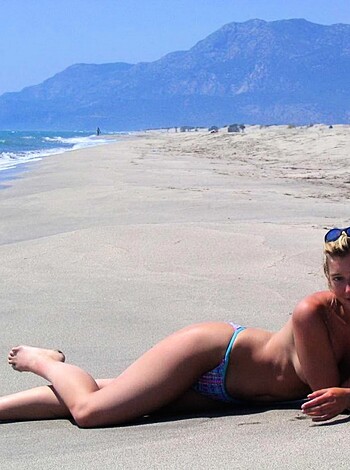 Fucking bitch with tits and ass spread out on the fucking beach like a goddamn slut, her cunt-hole open for any dick to stick in it.