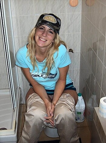"Here's a snapshot of some chick squatting on the shitter, with her head covered in a goddamn Yankees hat."